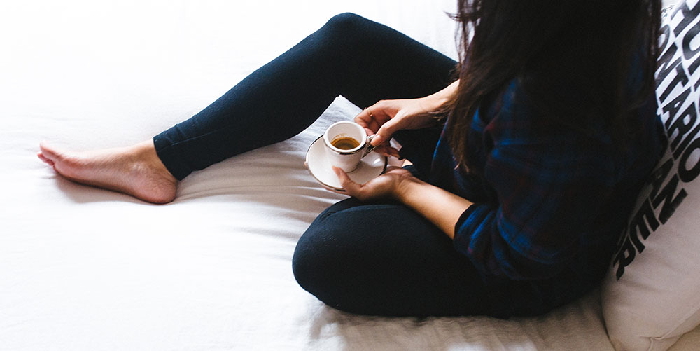 enjoying coffee in bed